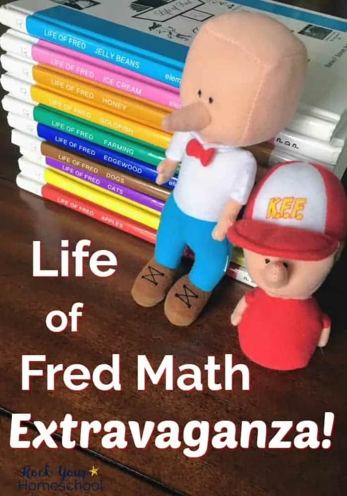 Life of Fred math books & dolls on wood table