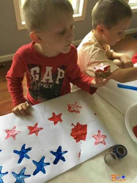 Using a star potato stamp to create patriotic crafts is such fun with kids!