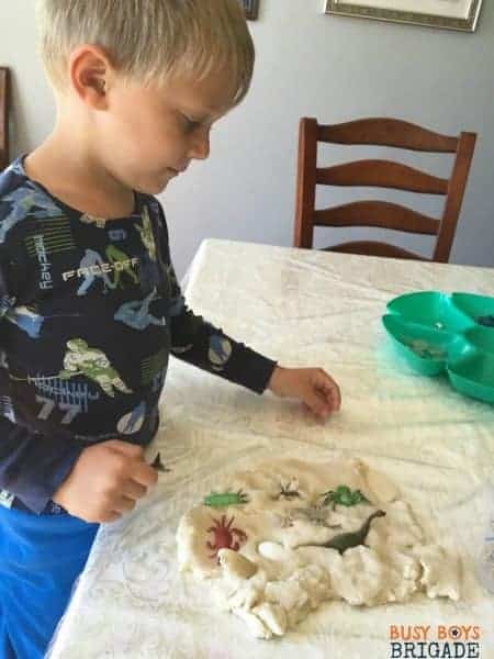 More playdough fun with seashell activities. Here is a beach scene that you can make using homemade playdough and seashells.