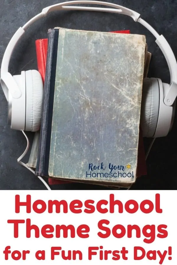 White headphones, gray & red book on chalkboard