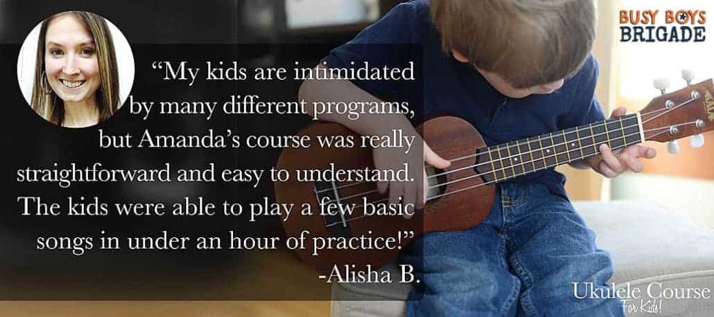 boy holding a ukulele