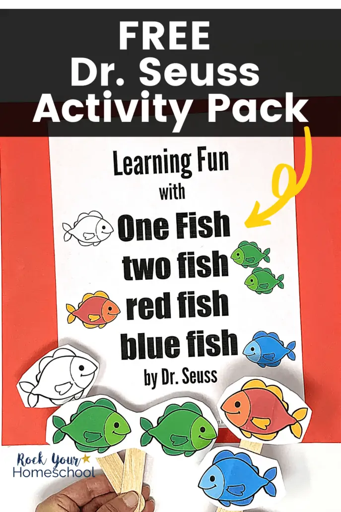 Woman holding One fish two fish red fish blue fish story props to feature how much your kids will have learning fun with this free printable pack of Dr. Seuss book activities