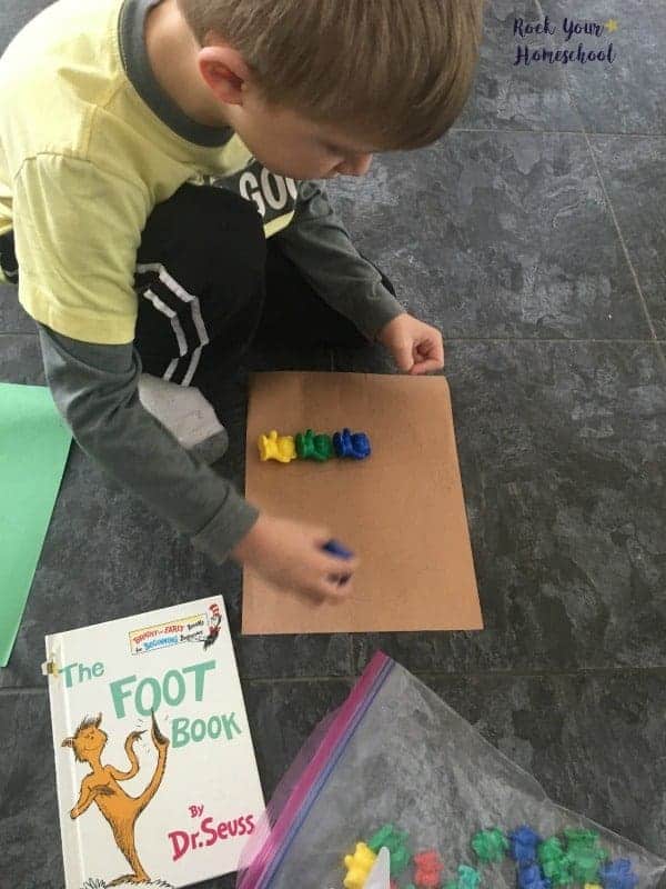 Use math manipulatives to measure feet! A fun learning activity found here for The Foot Book by Dr. Seuss.