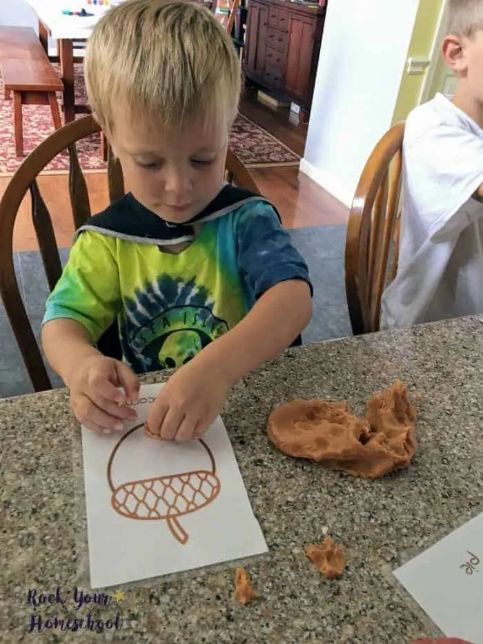 Have some fantastic learning fun with your kids with these free Fall playdough mats.