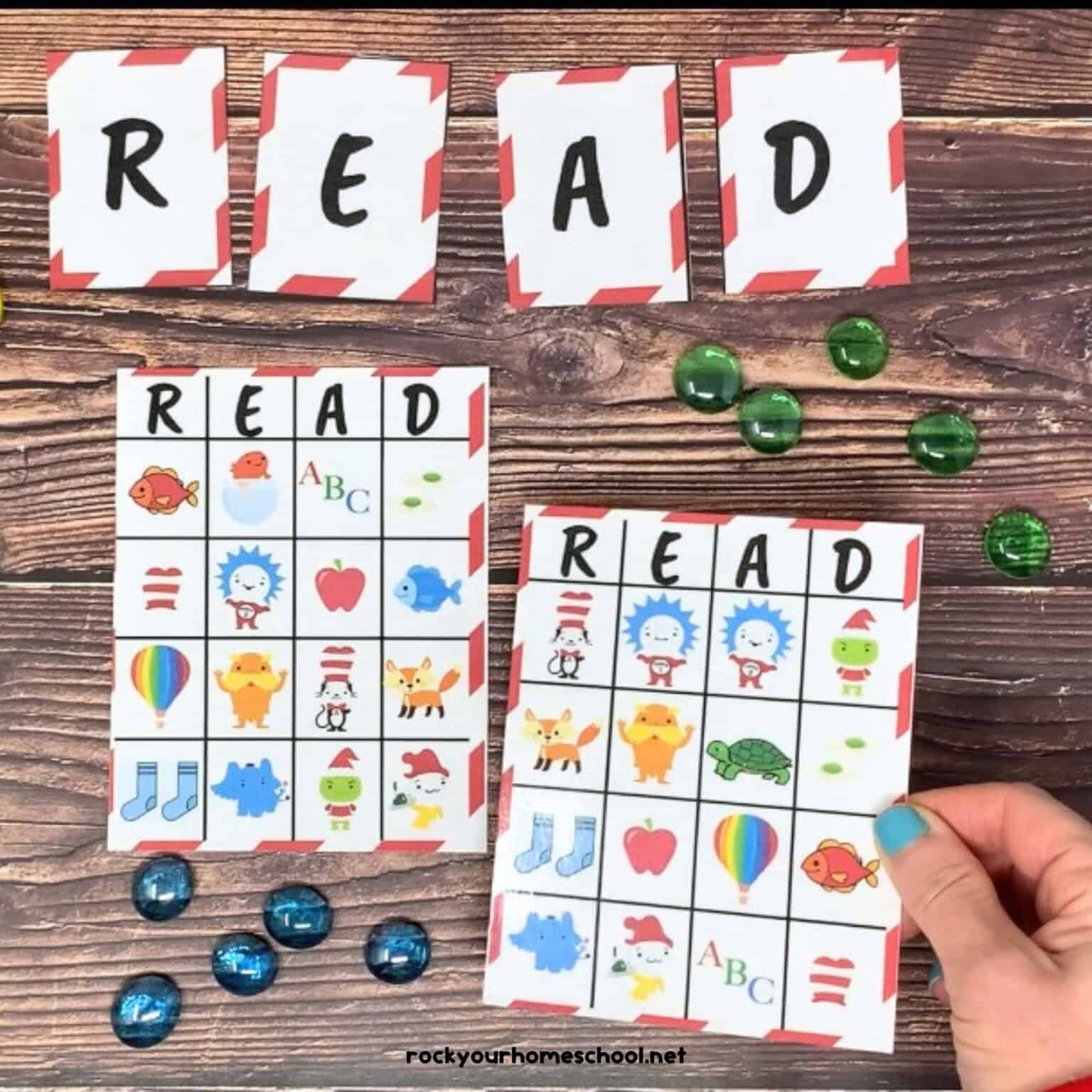 Woman holding free printable Dr. Seuss-Inspired bingo game to play R-E-A-D with Dr. Seuss characters and markers.