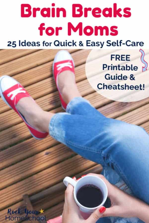 Woman wearing red and white sneakers &amp; blue jeans is sitting with legs crossed &amp; holding a white mug of coffee with red-painted finger nails on wood deck in the sun