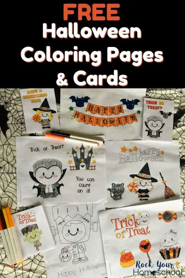 Halloween coloring pages & cards on spider web tablecloth with markers for kids to enjoy