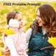 Smiling mom with arm around daughter wearing pink earmuffs & pink coat with yellow leaves in background