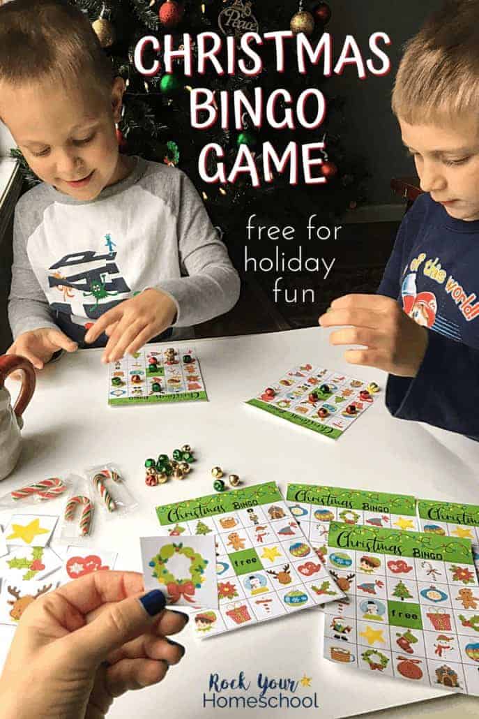 Mom playing Christmas bingo game to feature the wonderful holiday fun for kids you'll have with this set