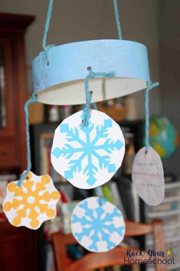 Create a beautiful Snowflake Haiku mobile using this free printable pack & guide for snowflake poetry craft for winter haiku fun.