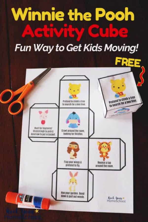 Winnie the Pooh Activity Cube printable page and cube with orange scissors & glue stick on dark wood for an easy way to get kids moving & have fun