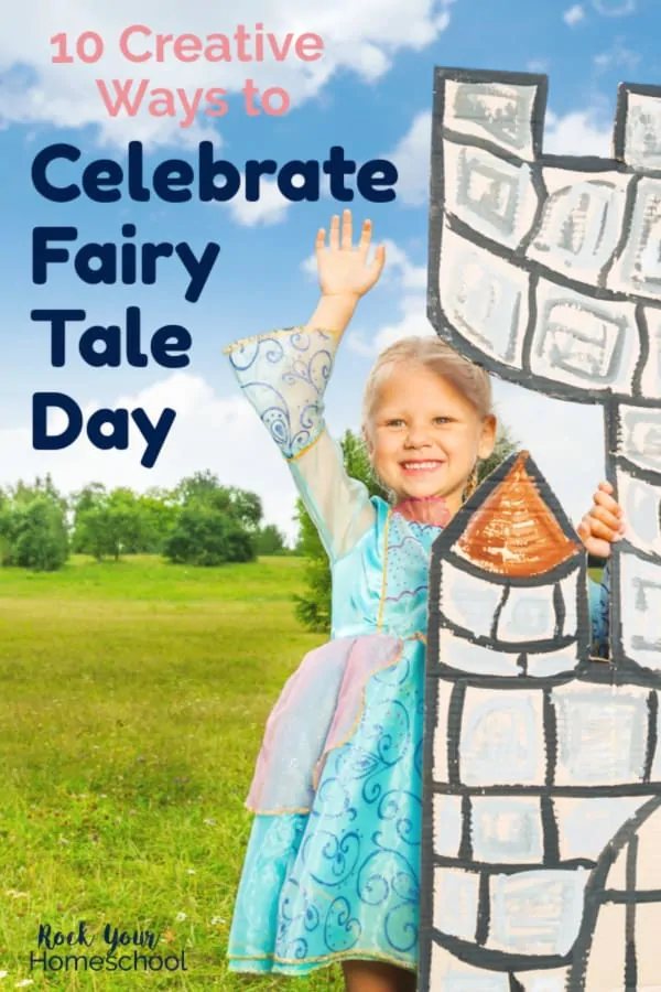 Young girl wearing princess costume is smiling and waving as she stands behind cardboard castle on green grass with sunny sky to feature a creative way to celebrate Fairy Tale Day with kids