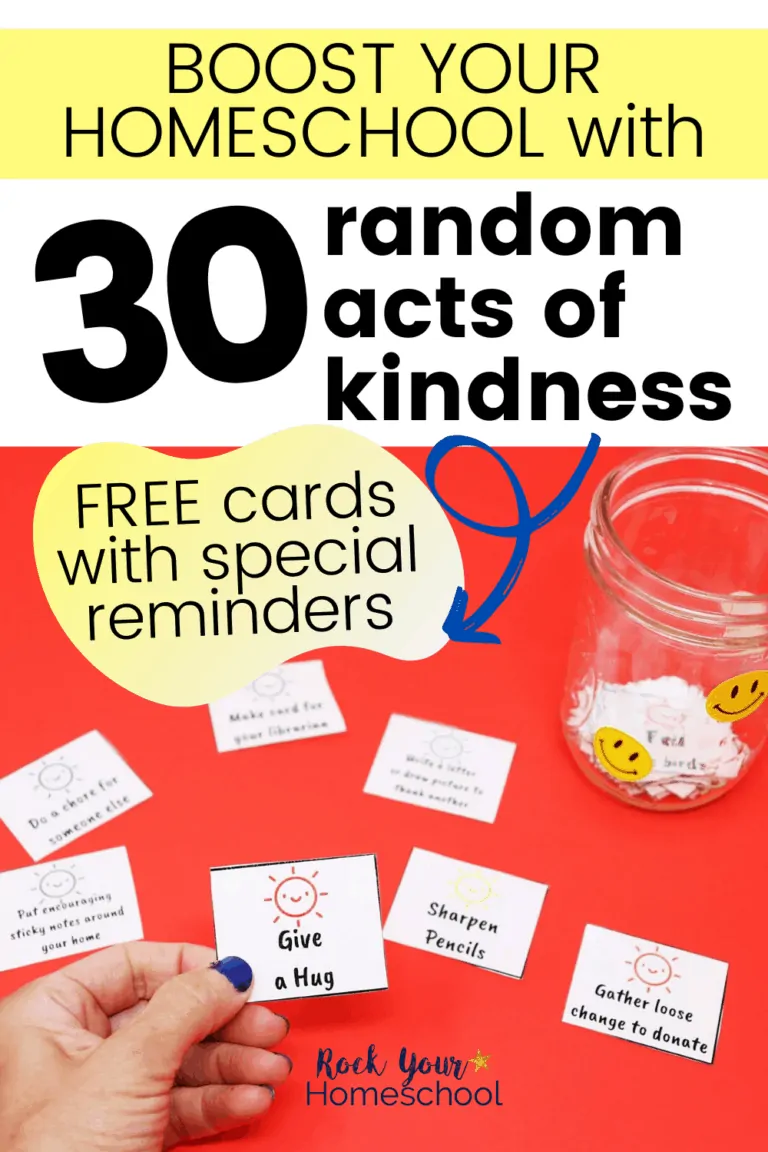 Woman holding random acts of kindness card with other cards and glass jar with smiley face stickers in background to feature how you can use these 30 free random acts of kindness cards to boost your homeschool