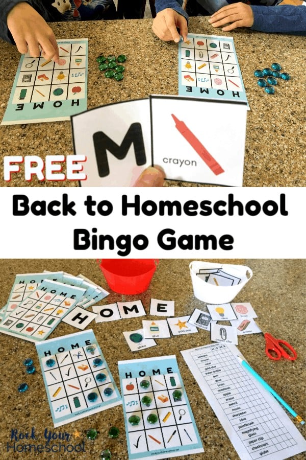 2 boy playing Back to Homeschool Bingo with green & blue colored glass markers on granite surface & mom holding up M and crayon cards and Back to Homeschool Bingo Game printables, red scissors, & red plastic container on granite surface