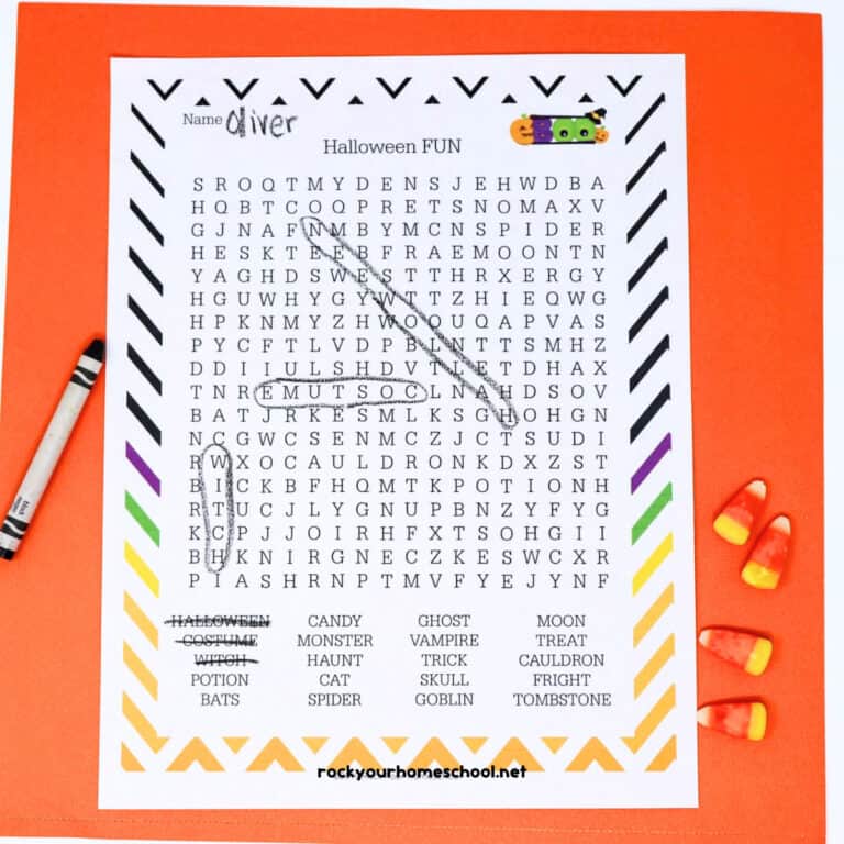 Example of Halloween word search with black crayon and candy corn.