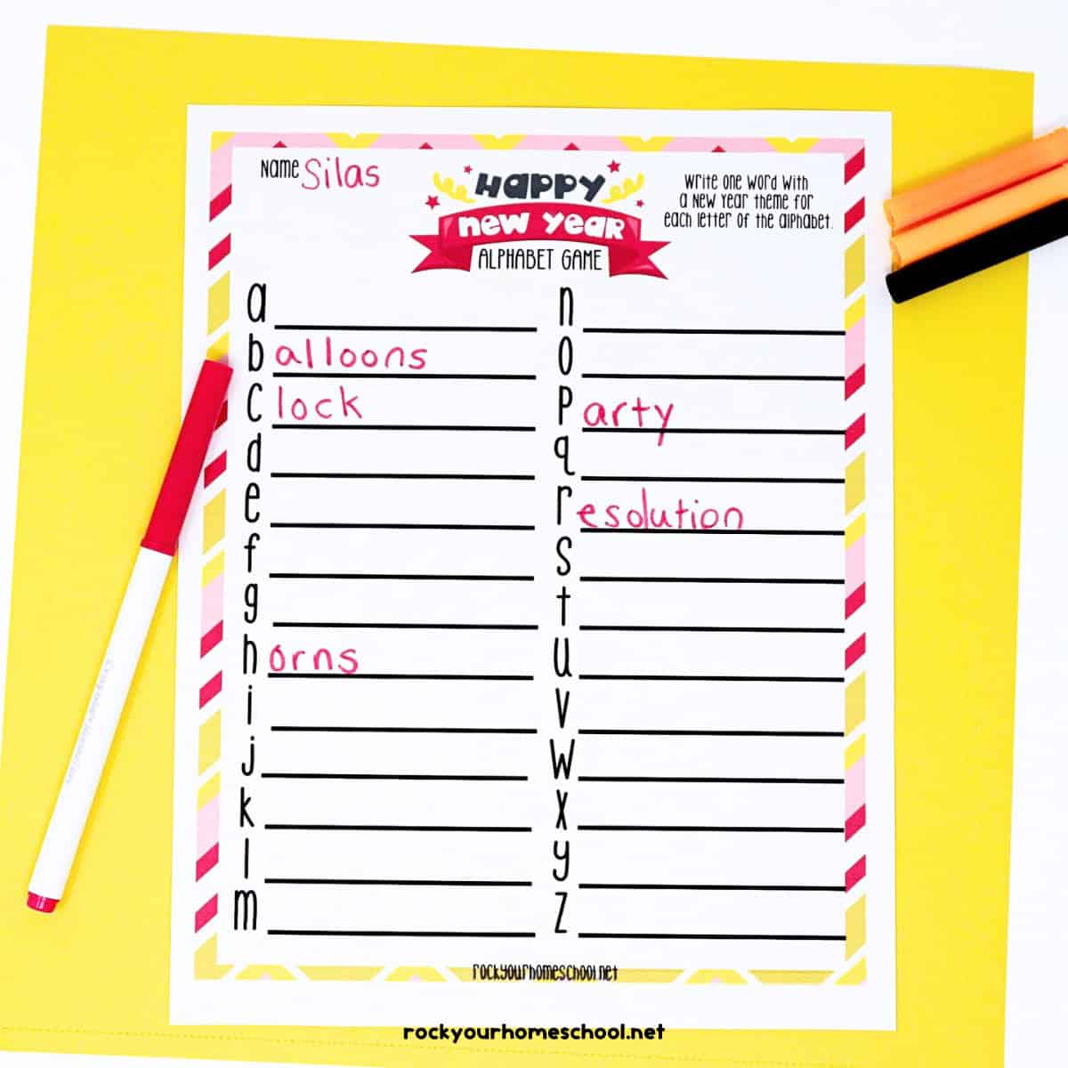 Free printable New Year's Eve alphabet game with markers on yellow background.