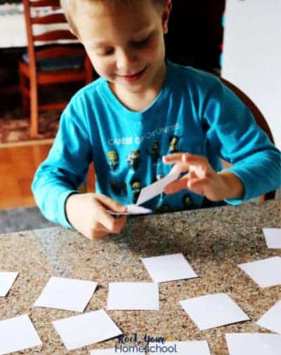 This boy is excited to practice reading with this free sight words memory game.