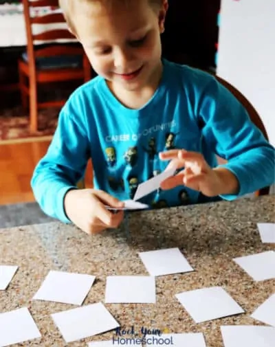 This boy is excited to practice reading with this free sight words memory game.