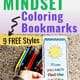 Woman holding a growth mindset coloring bookmark with color pencils in the background to feature the amazing ways your kids can use and learn with these free printable growth mindset activities.
