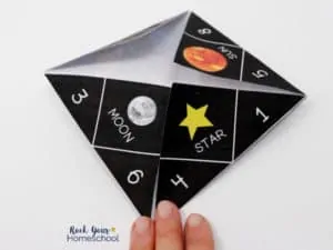 Your kids will love this solar system activity with a cootie catcher & planet fact cards.