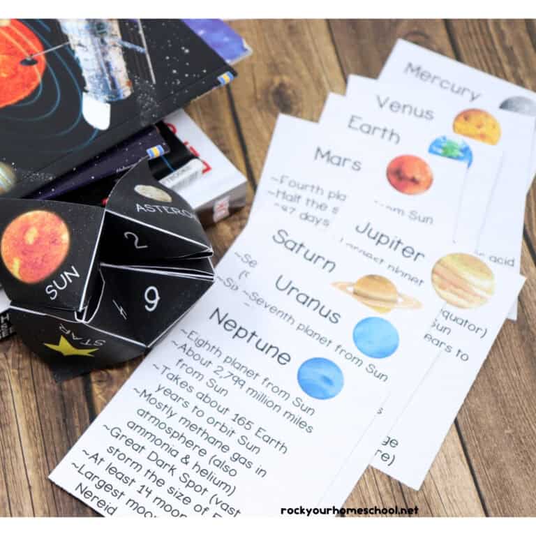 Solar system cootie catcher and fact cards with books.