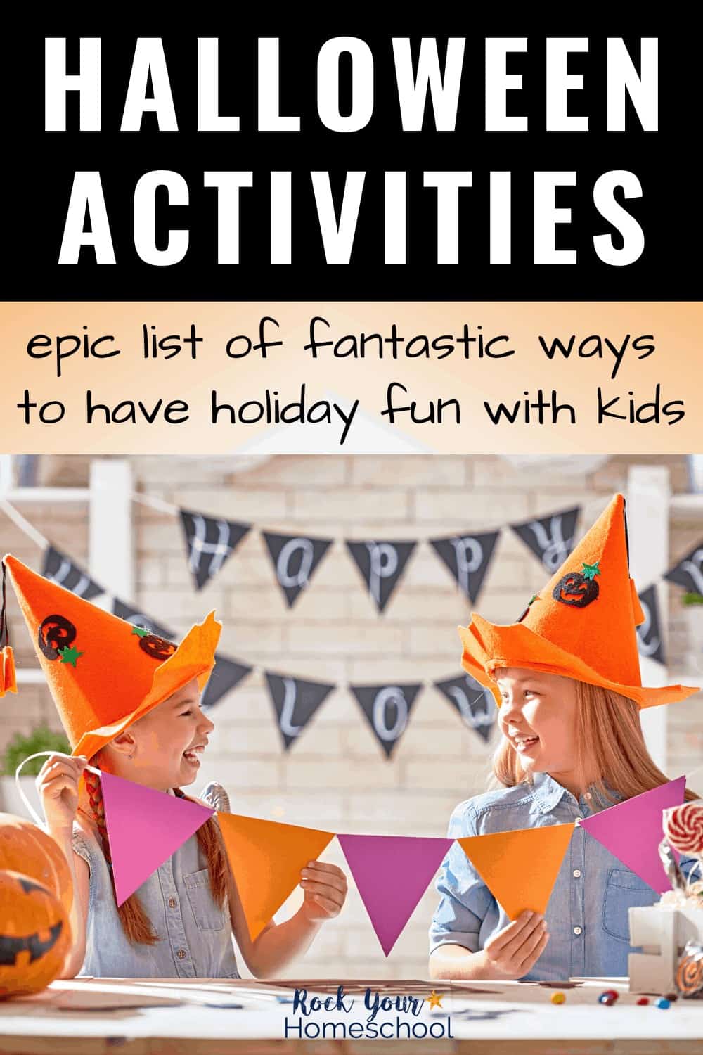 Two girls smiling at each other and wearing jack o\' lantern hats as they hold purple & orange banner to feature this epic list of Halloween activities for kids that you can use to make this holiday special this year.