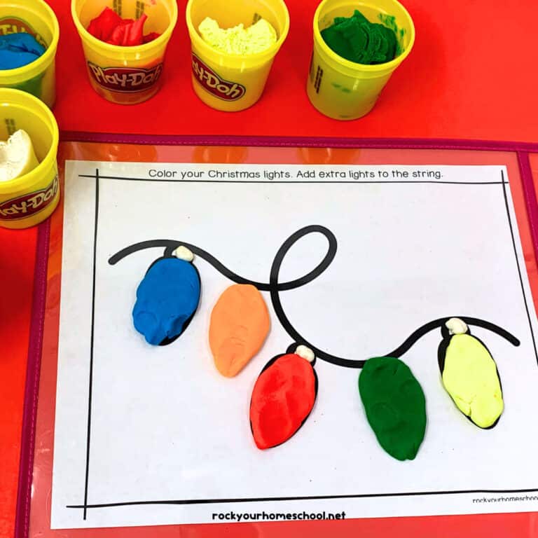 Holiday lights playdough mats to feature the amazing holiday fun your kids will have with these 15 free Christmas playdough mats.