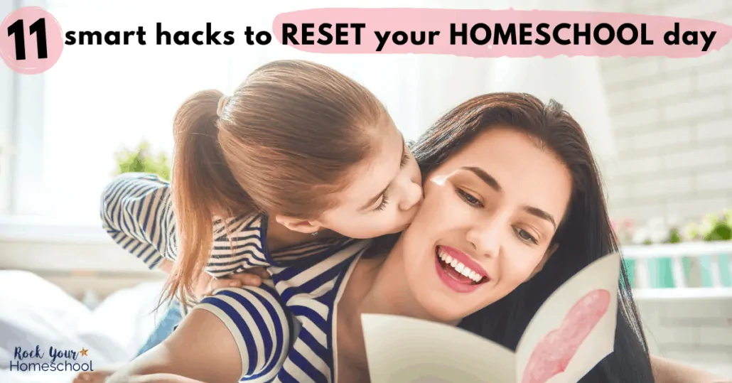 Daughter kissing mother on cheek who is holding homemade card to feature how you can use these 11 smart hacks when you need to reset your homeschool day
