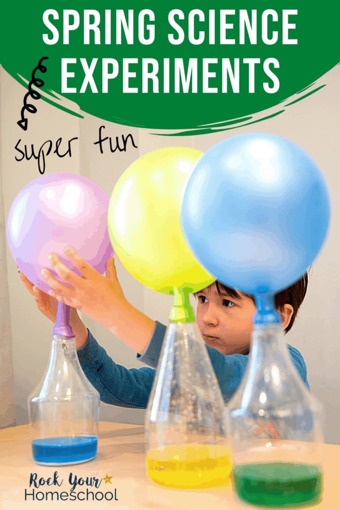 Boy using colorful solution in beaker to make colorful balloons inflate to feature the fantastic learning fun at home you\'ll have with these Spring science experiments