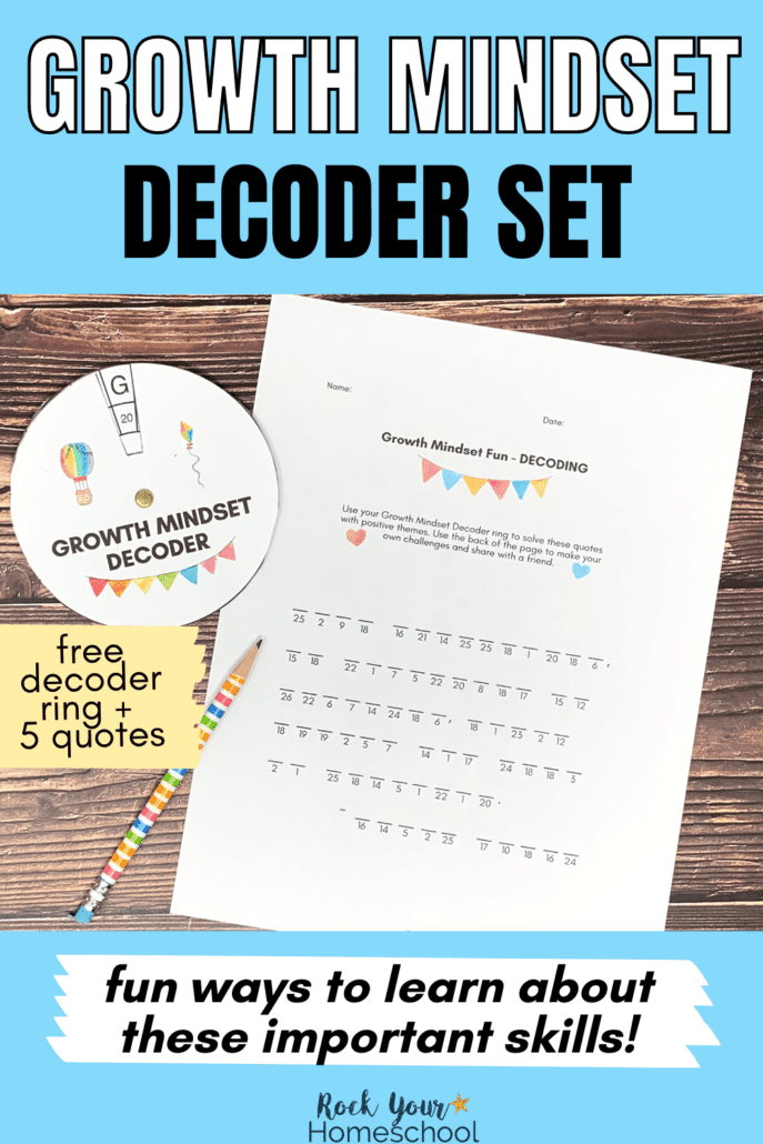 free printable growth mindset decoder ring and printable page with quote and rainbow striped pencil on wood background