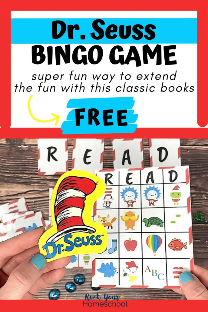 Woman holding free printable Dr. Seuss bingo card and Dr. Seuss Cat in the Hat eraser with bingo cards and markers on wood background