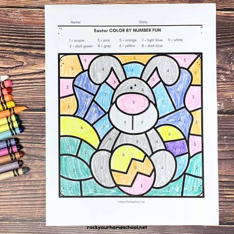 Example of Easter color by number page featuring Easter bunny with eggs and crayons.