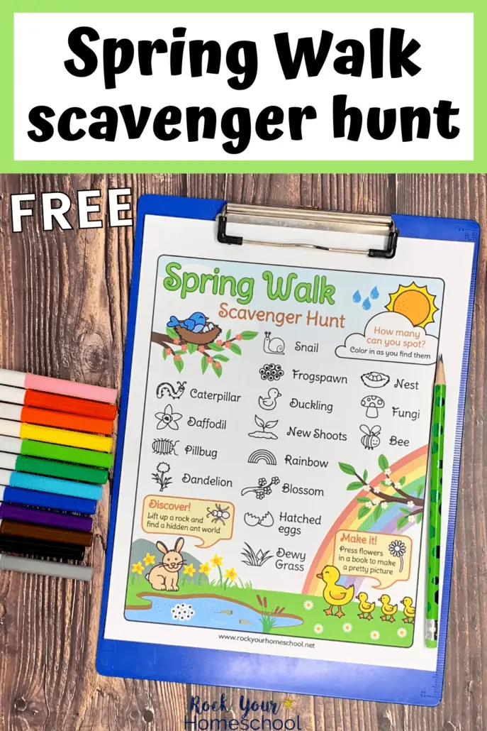 free printable Spring Walk scavenger hunt on blue clipboard with rainbow of markers on wood background