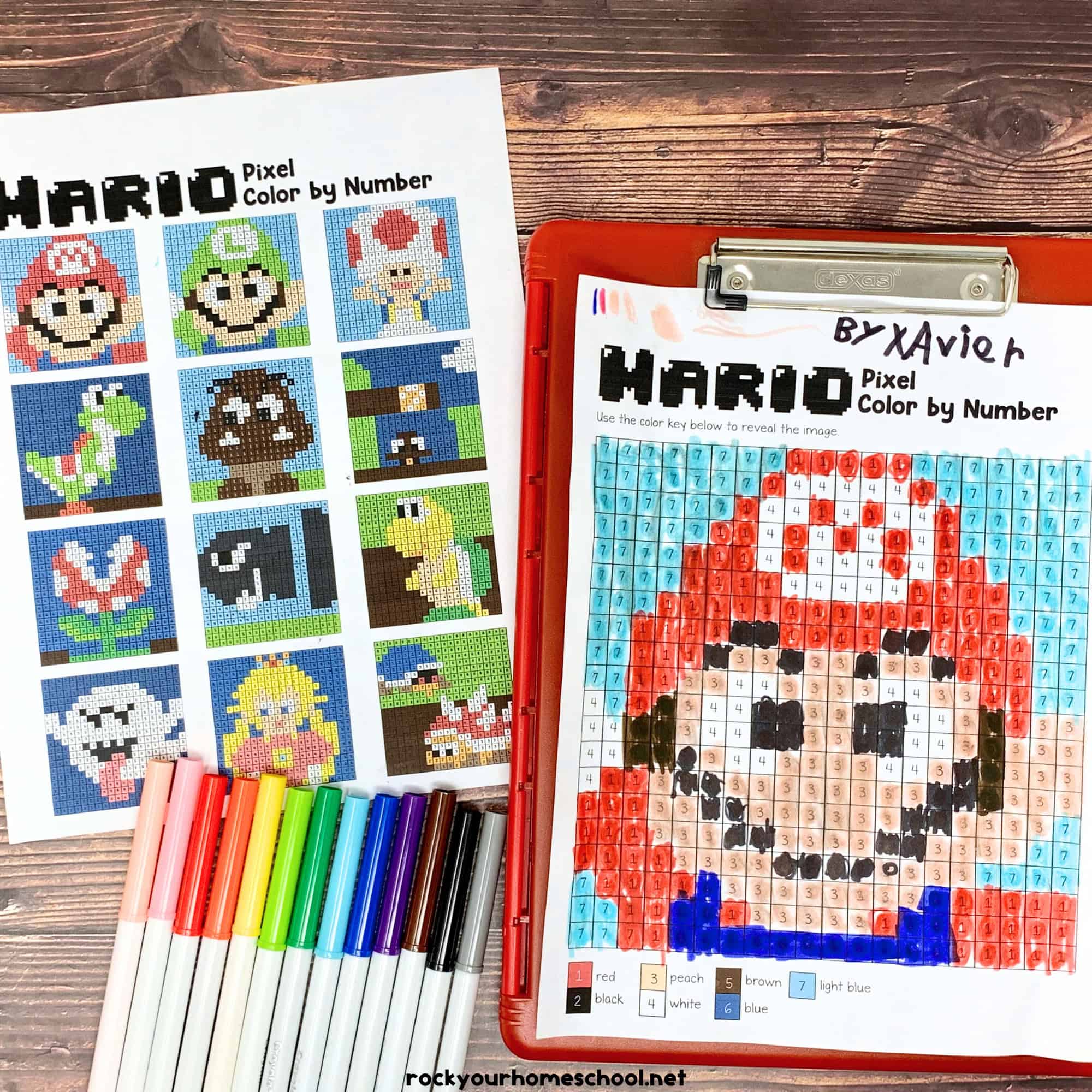 answer key for 12 free Super Mario pixel coloring pages and example of Mario on red clipboard with rainbow of markers on wood background.