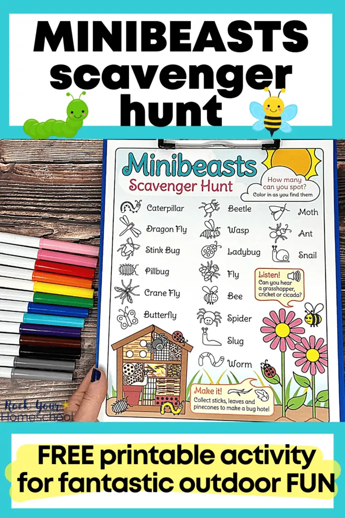 woman holding free printable minibeasts scavenger hunt on clipboard with rainbow of marker on wood background