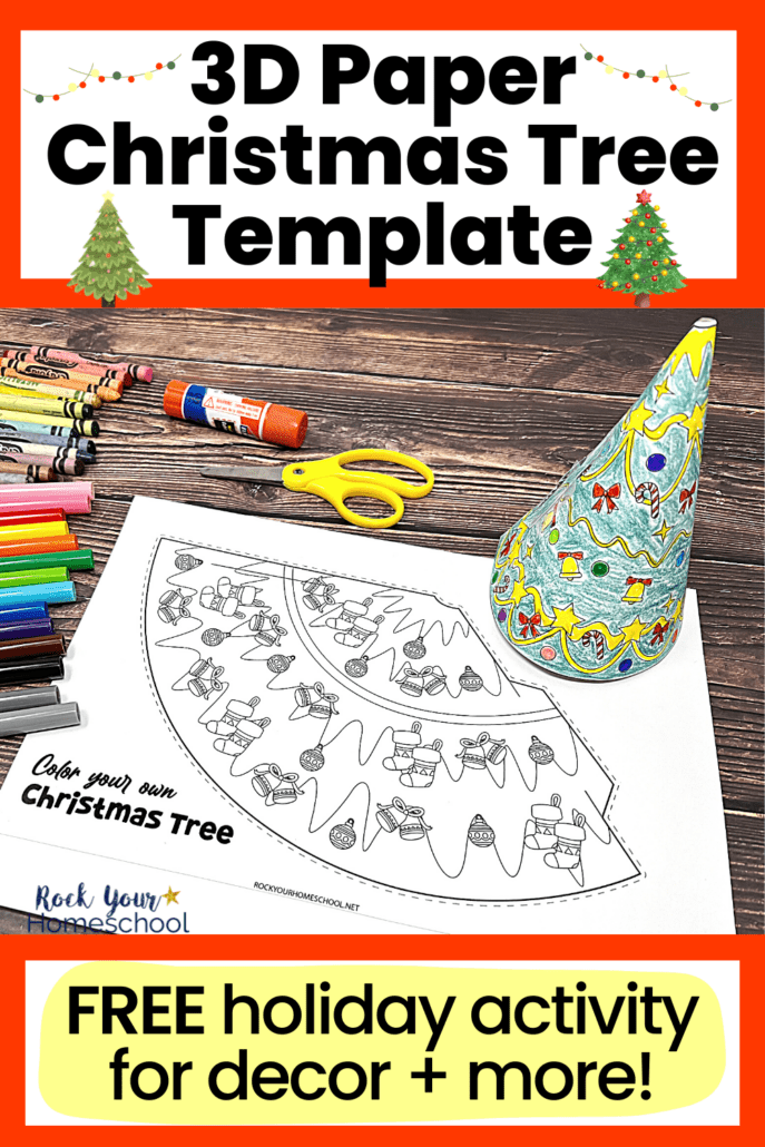 printable 3D Christmas tree template example with black-and-white page and rainbow of crayons and markers with glue stick and yellow scissors on wood background