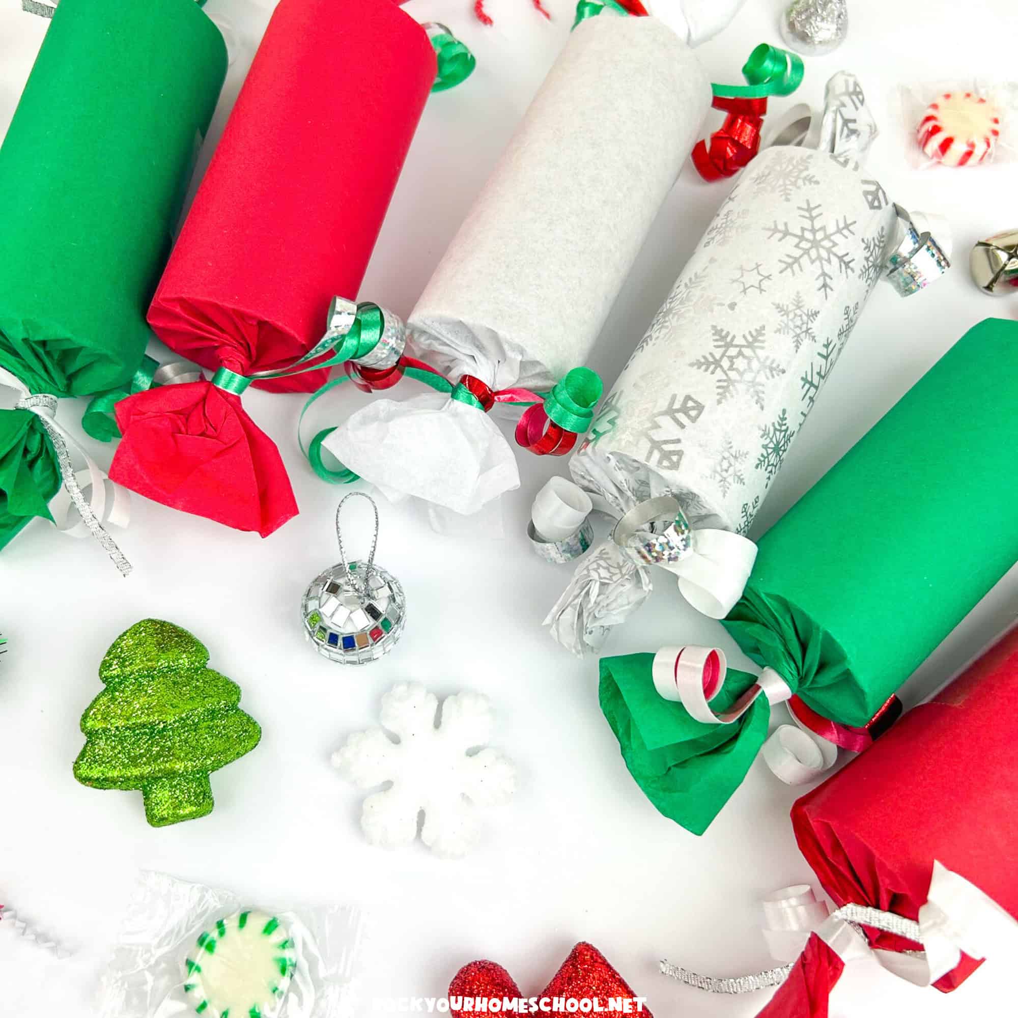Examples of Christmas party poppers in green, red, white, and silver, with peppermint and chocolate candies.