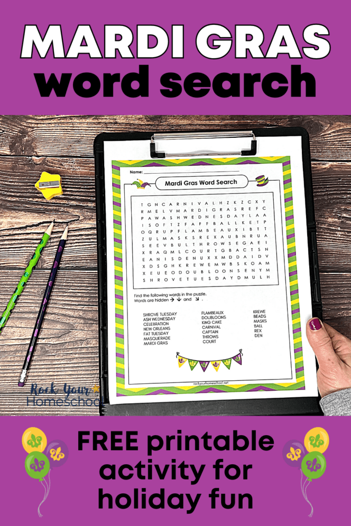 woman holding black clipboard with free printable Mardi Gras word search and green pencil, purple pencil, and yellow star-shaped pencil sharpener on wood background