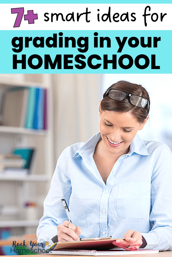 smiling mom grading papers on a clipboard with a black pen to feature how to grade homeschool assignments