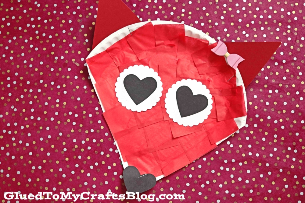 Tissue paper fox with black heart eyes and nose for Valentine's Day fun.