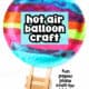 Tissue paper hot air balloon craft with popsicle stick basket.