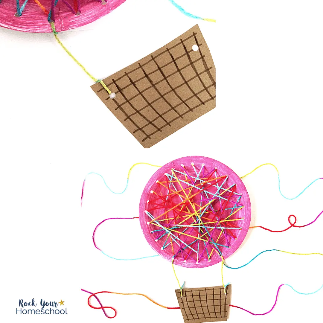 step 4 making hot air balloon yarn weave craft with brown paper basket and rainbow yarn
