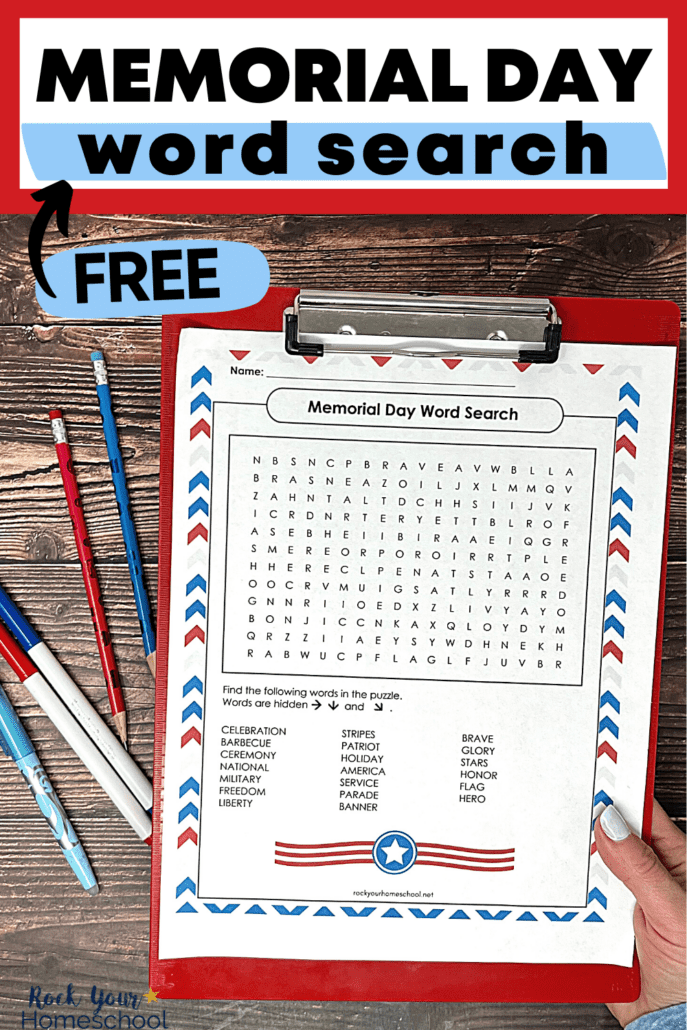 woman holding free printable Memorial Day word search puzzle