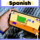 Boy holding iPod and playing FabuLingua, the best app to learn Spanish.