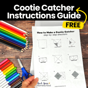Woman holding free printable cootie catcher instructions guide.