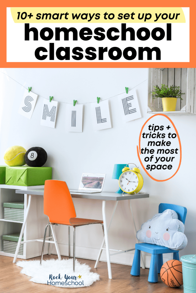Example of a homeschool classroom setup with the word smile spelled out in posters, simple desk and chair, and clock.