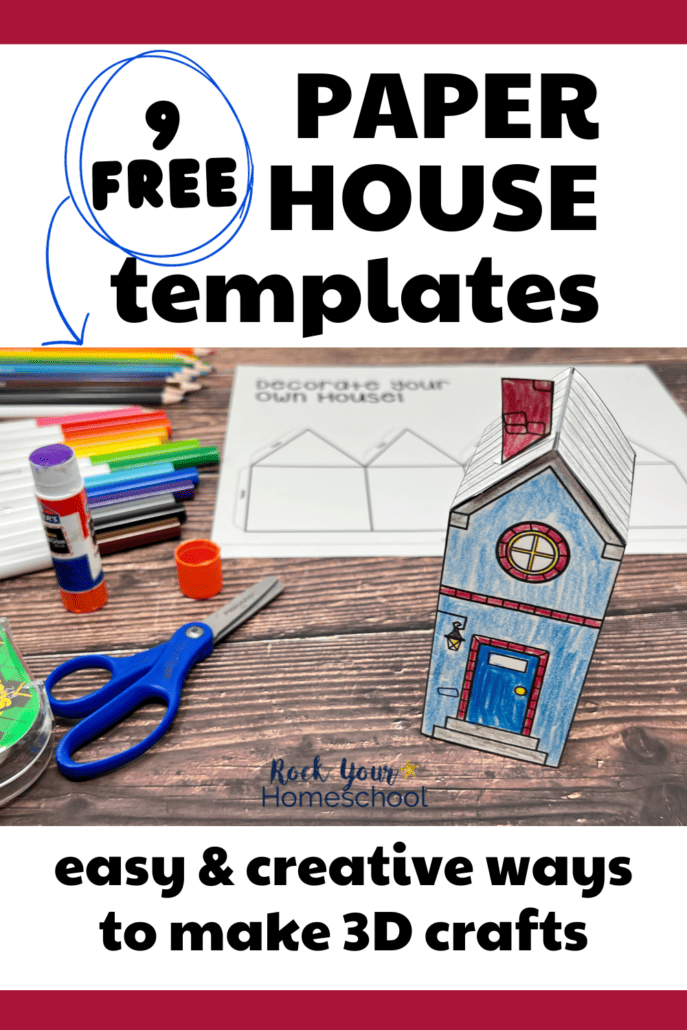 Example of 3D paper house with free printable template and color pencils, markers, scissors, glue stick and tape in background.