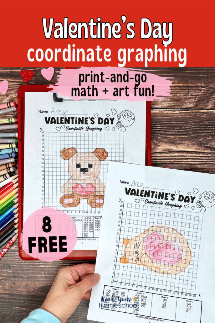 Woman holding example of free printable Valentine's Day coordinate graphing activities featuring napping cat with heart and teddy bear with heart on red clipboard.