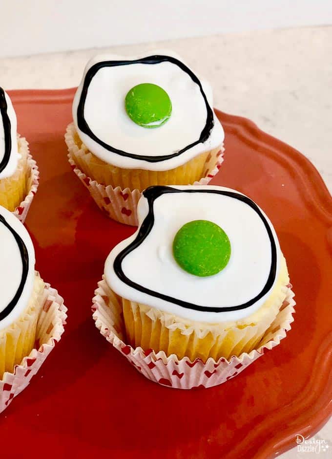 Two green egg cupcakes for Dr. Seuss recipes.