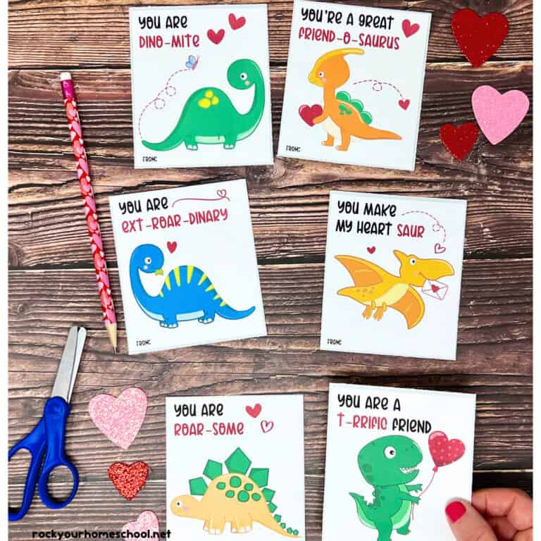 Six free printable cute dinosaur Valentine's Day cards for kids with glitter hearts.
